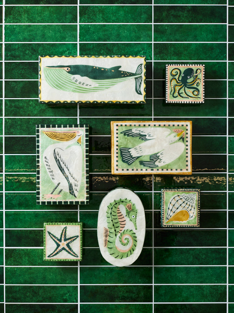 Seashell capiz trinket box styled with other hand painted coastal boxes