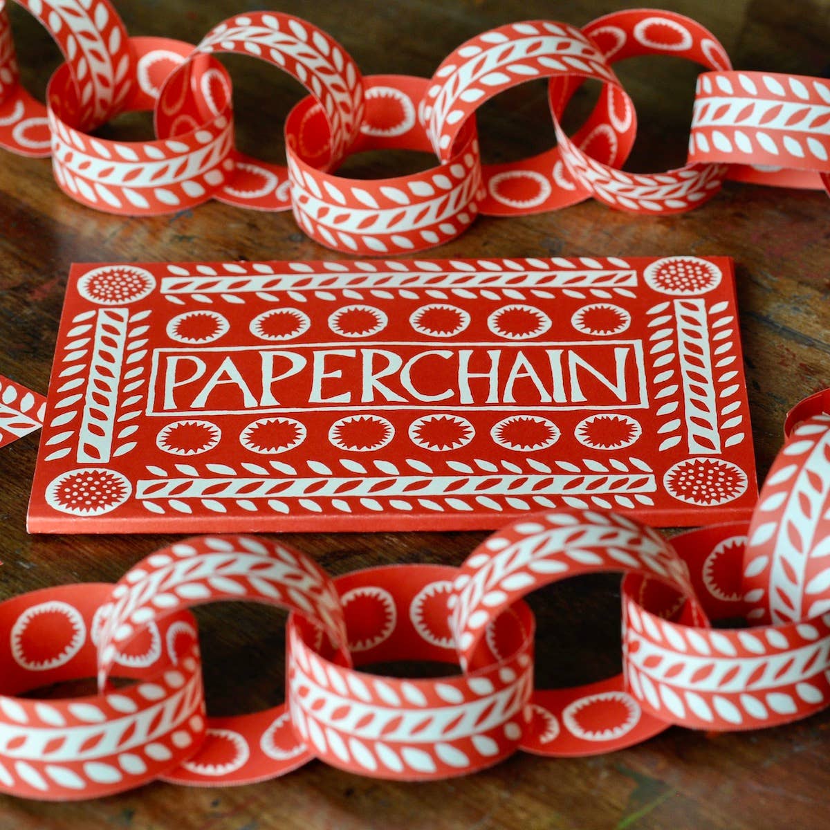Cambridge Imprint paperchain kit 3 with patterned paper strips and finished paperchain, view 4