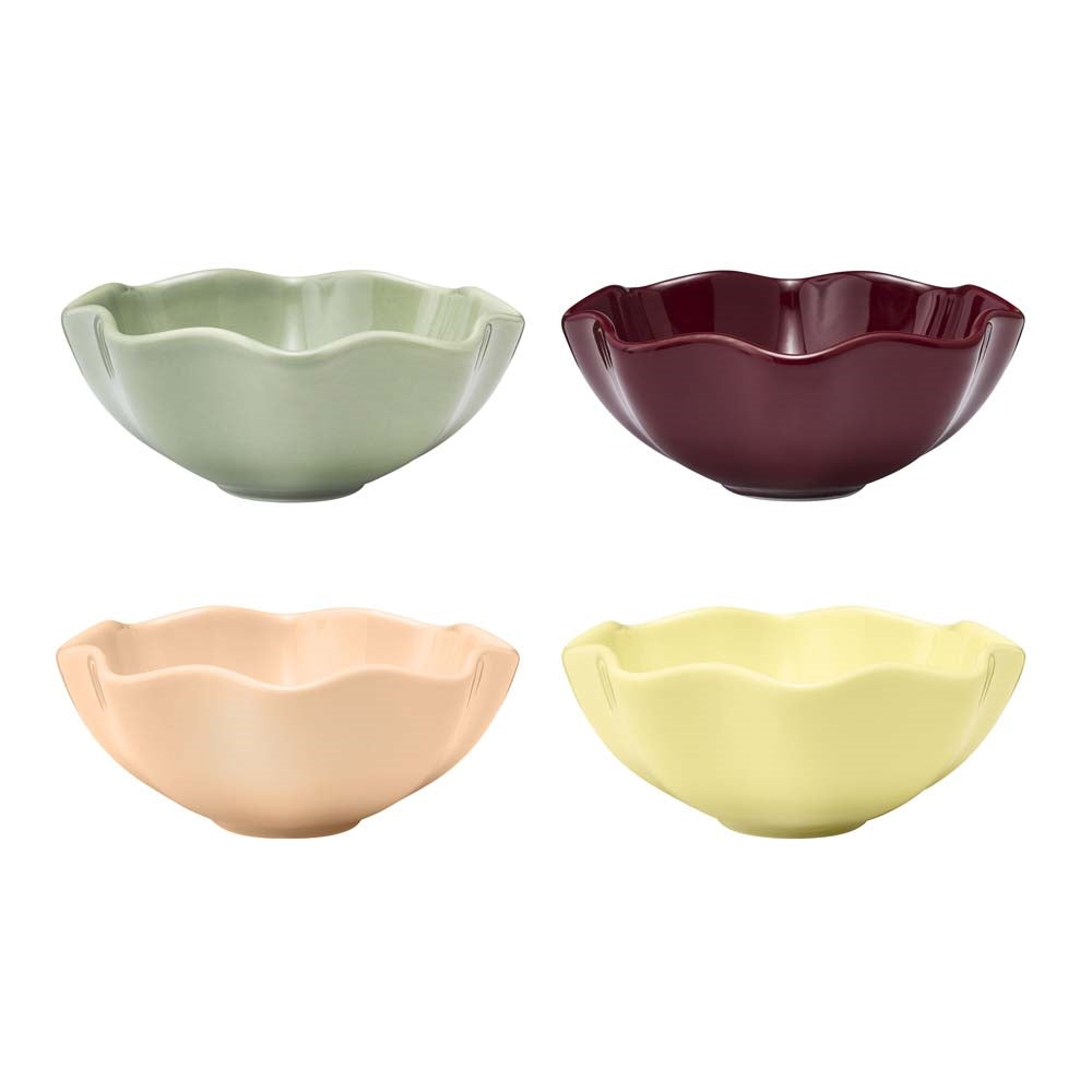 Four flower shaped fluted porcelain dip bowls in assorted colours
