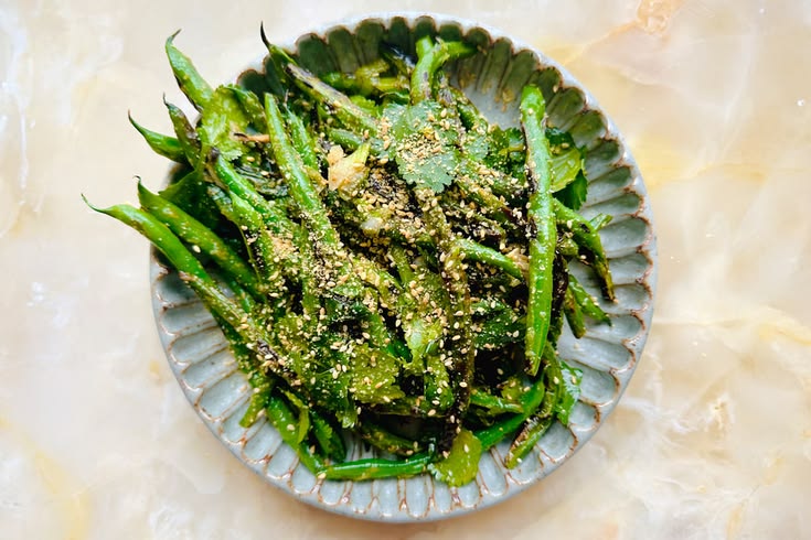 Fried green beans with Ottolenghi yuzu, ginger and miso marinade, sesame seeds and coriander