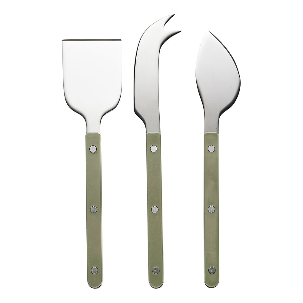 Three cheese knives with sage green riveted handles: a cleaver, a fork tipped knife and a spreader