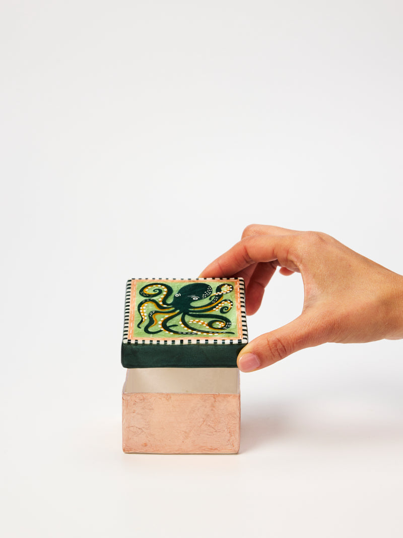 Open octopus capiz shell box showing space for rings and earrings