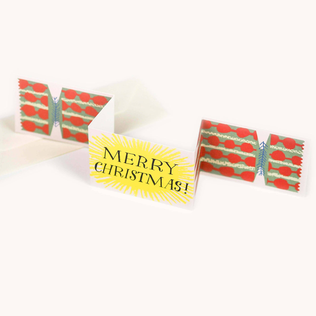 Hadley Christmas cracker shaped card with colourful splodge design detail