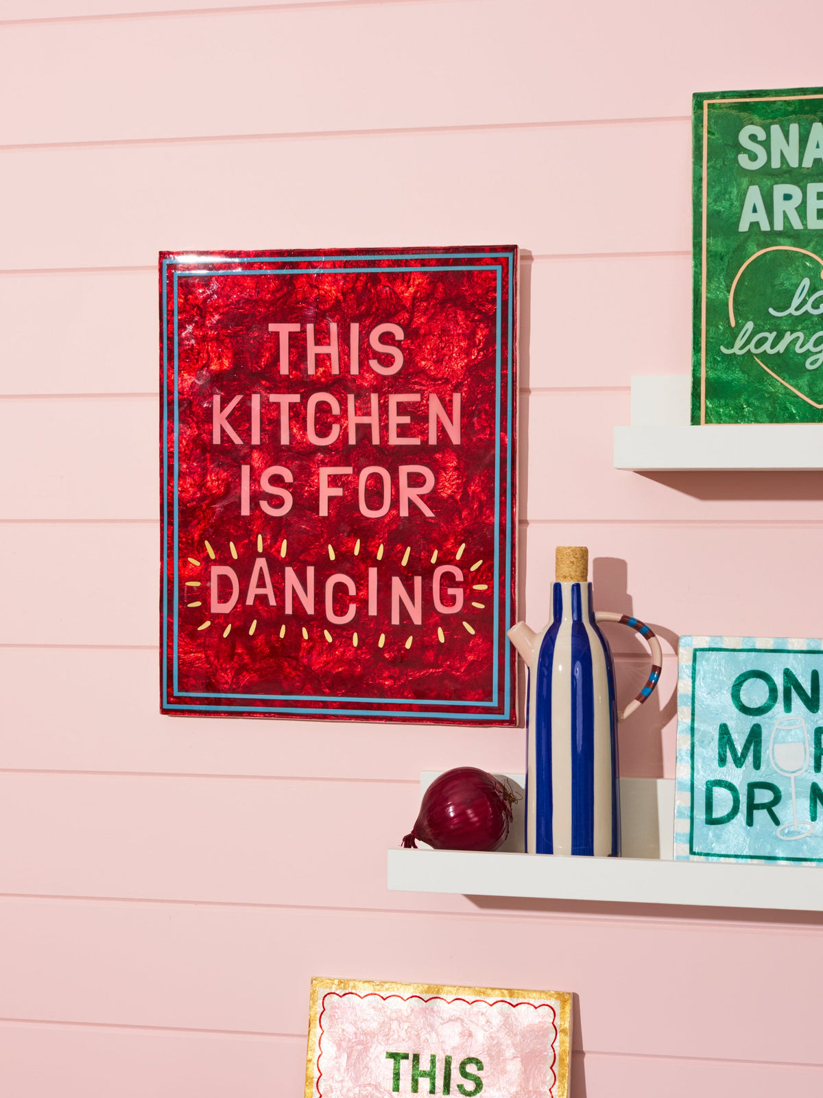 Large berry capiz shell kitchen wall tile styled on a kitchen wall