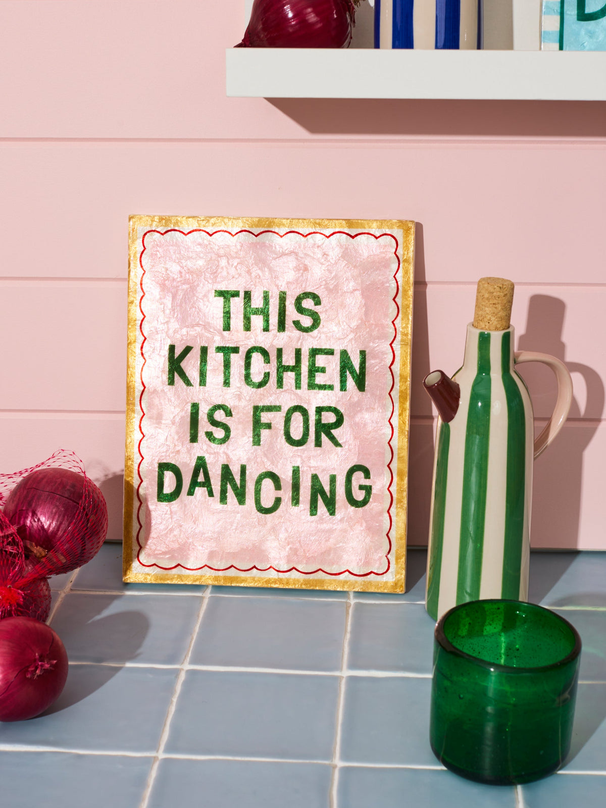 Blush pink capiz shell kitchen wall tile styled on a kitchen wall
