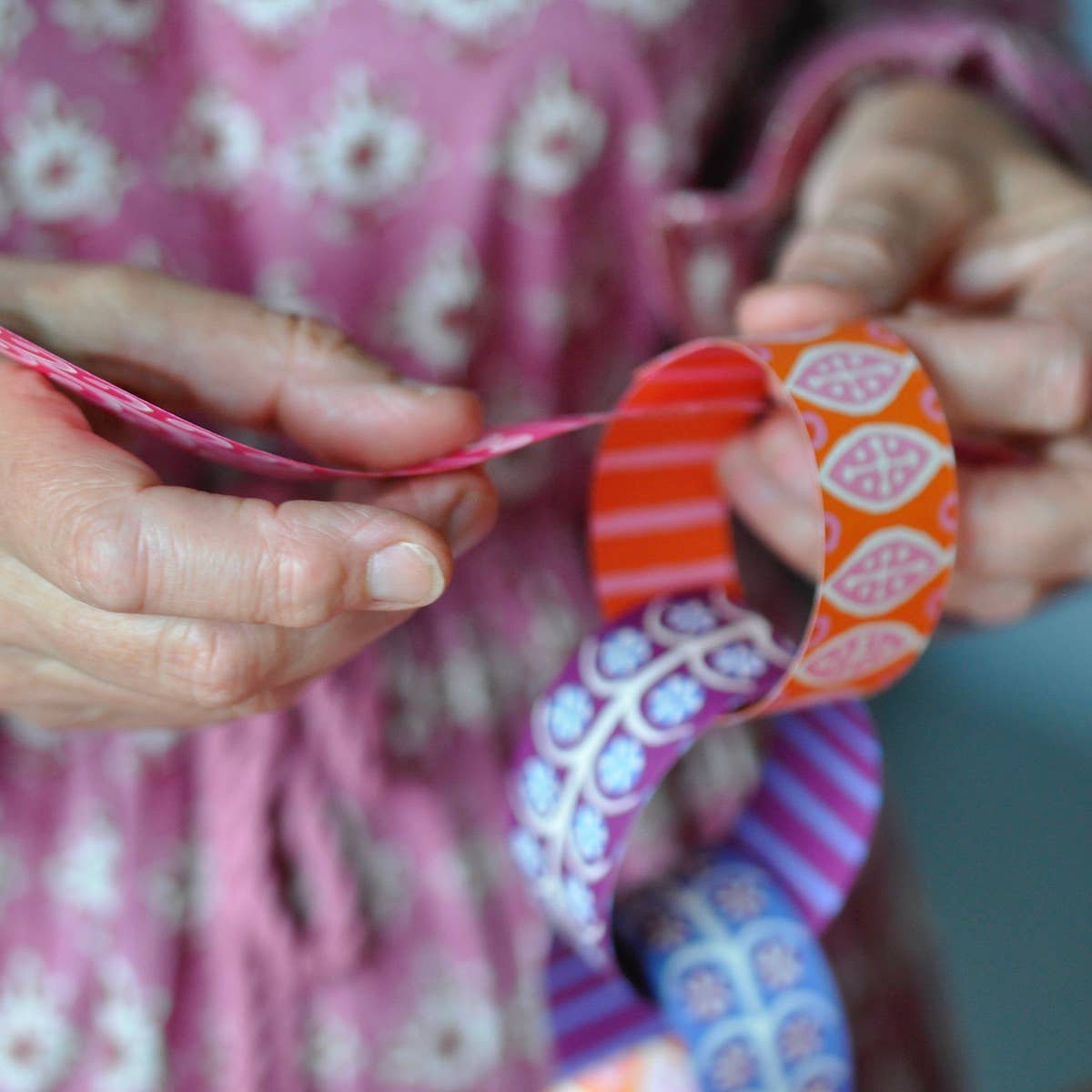 Cambridge Imprint paperchain kit 4 with patterned paper strips and finished paperchain, view 5
