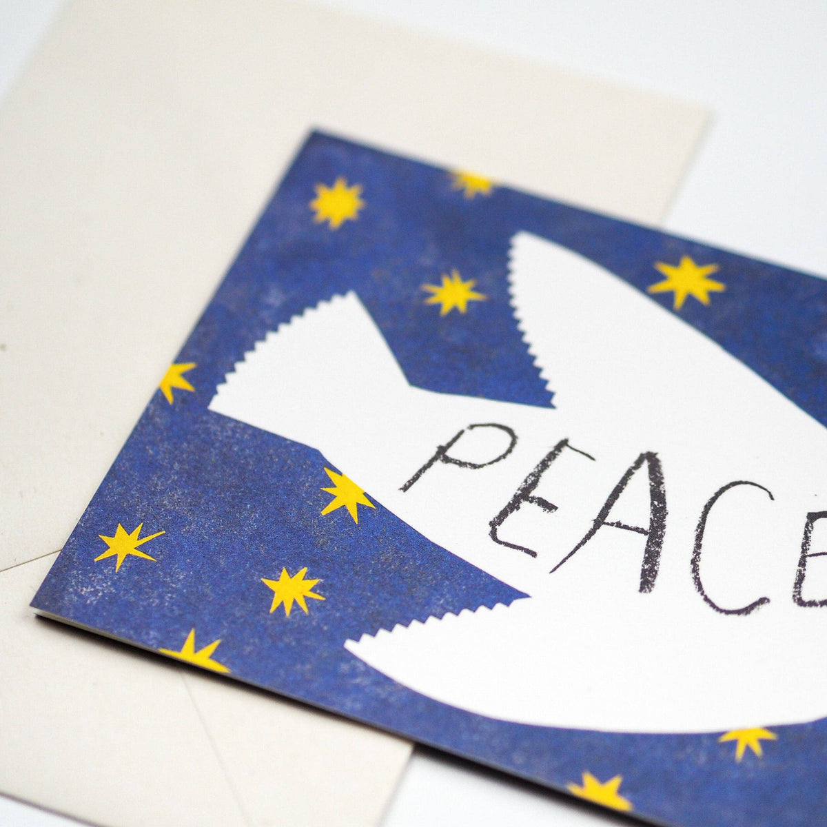 Hadley Christmas card of a white peace dove against a starry night sky detail