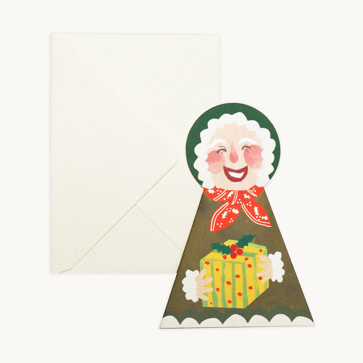 Hadley hand painted Mrs Claus stand up Christmas card holding a wrapped gift