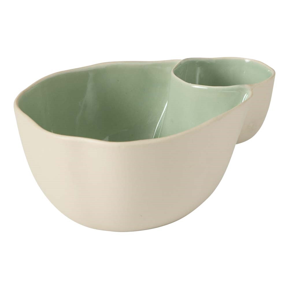 Stoneware olive bowl with a matte neutral outside and glossy green glazed inside