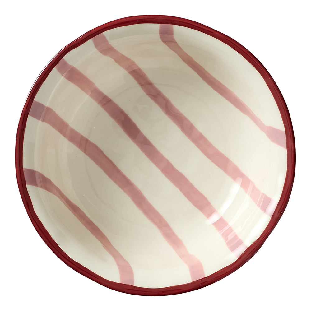 Stoneware serving bowl with red stripes, a maroon rim and dimpled texture