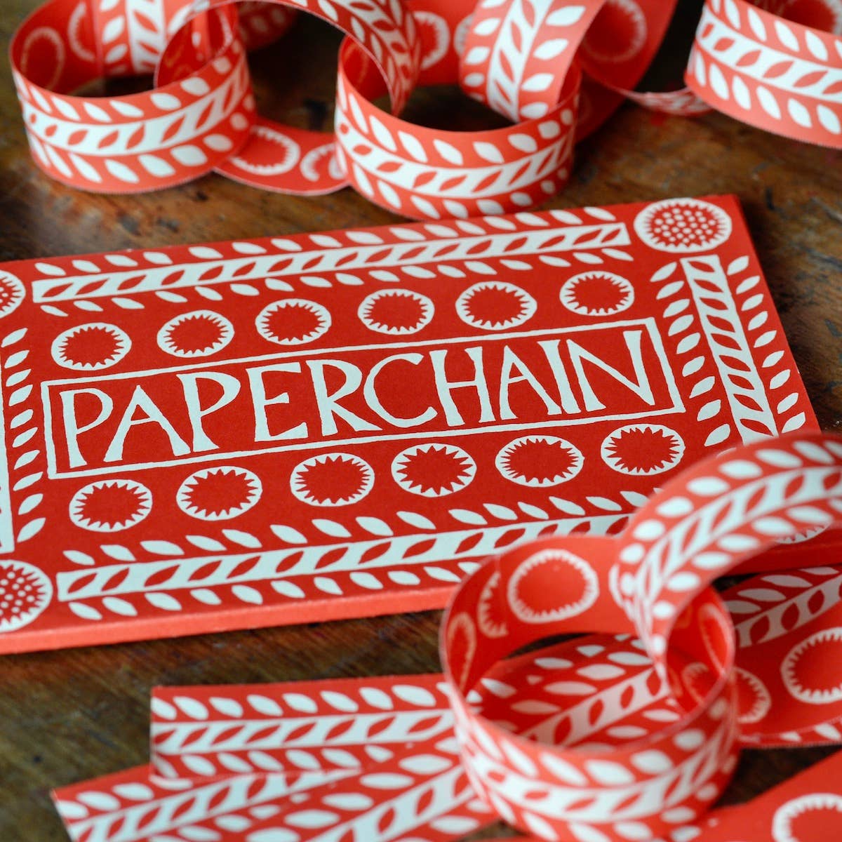 Cambridge Imprint paperchain kit 3 with patterned paper strips and finished paperchain, view 2